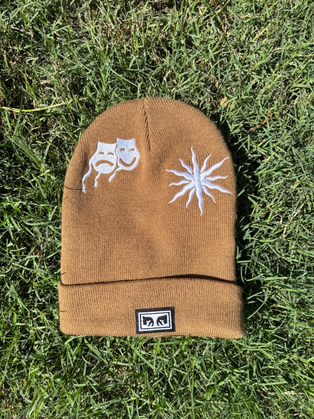 Obey tan beanie with white embroidered details